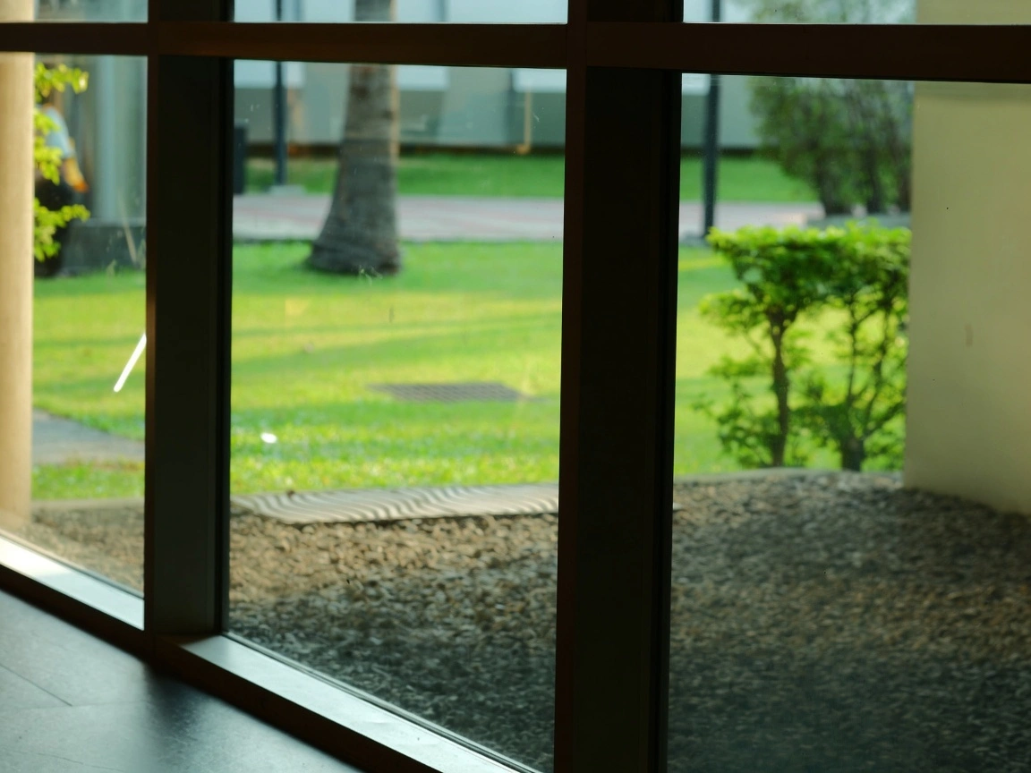 Exterior window film preventing artificial turf melt from window reflection in Mesa